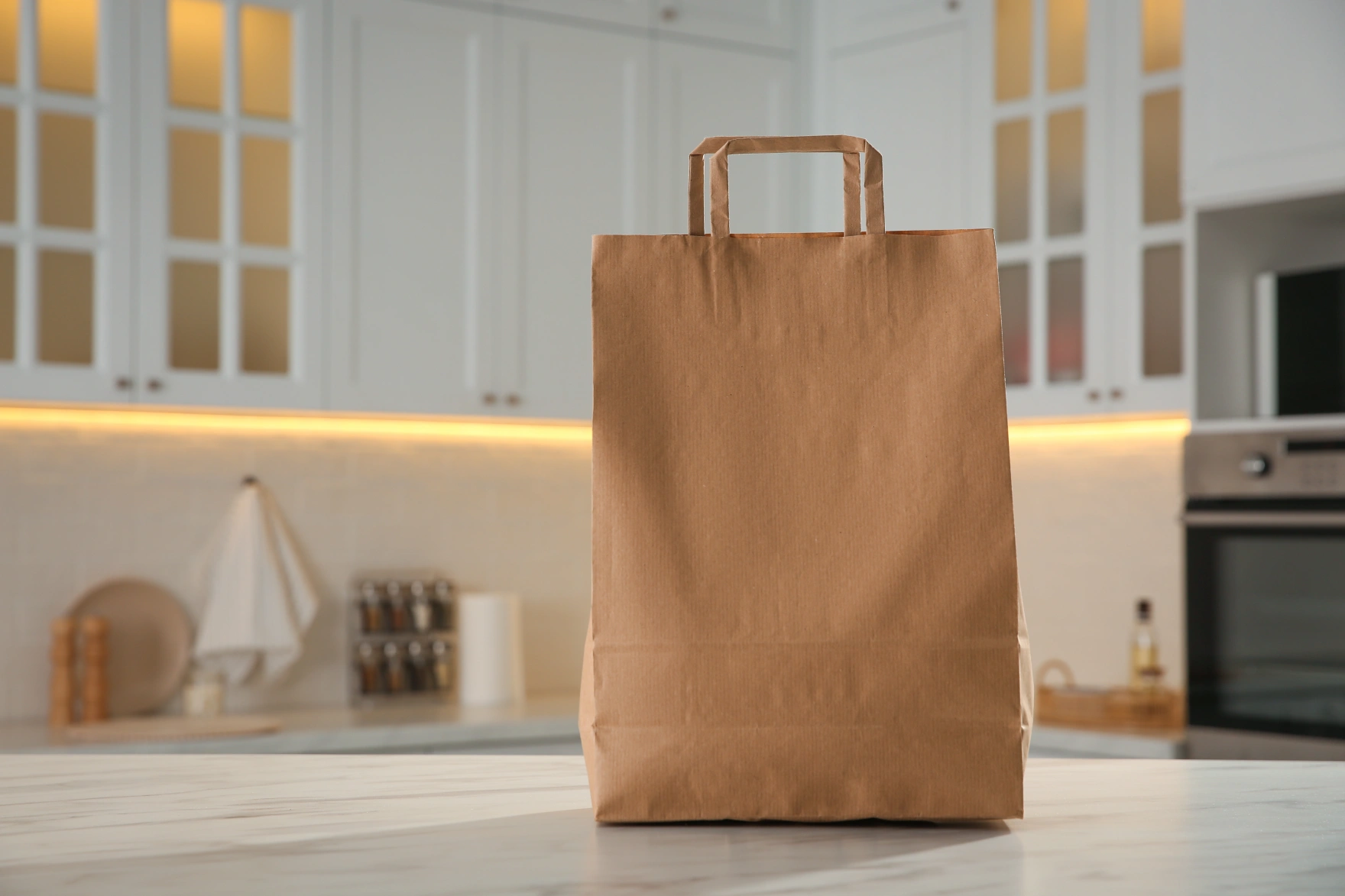 A brown bag sitting on top of a counter.
