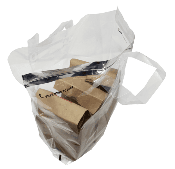 A bag of cardboard boxes sitting on top of a green background.