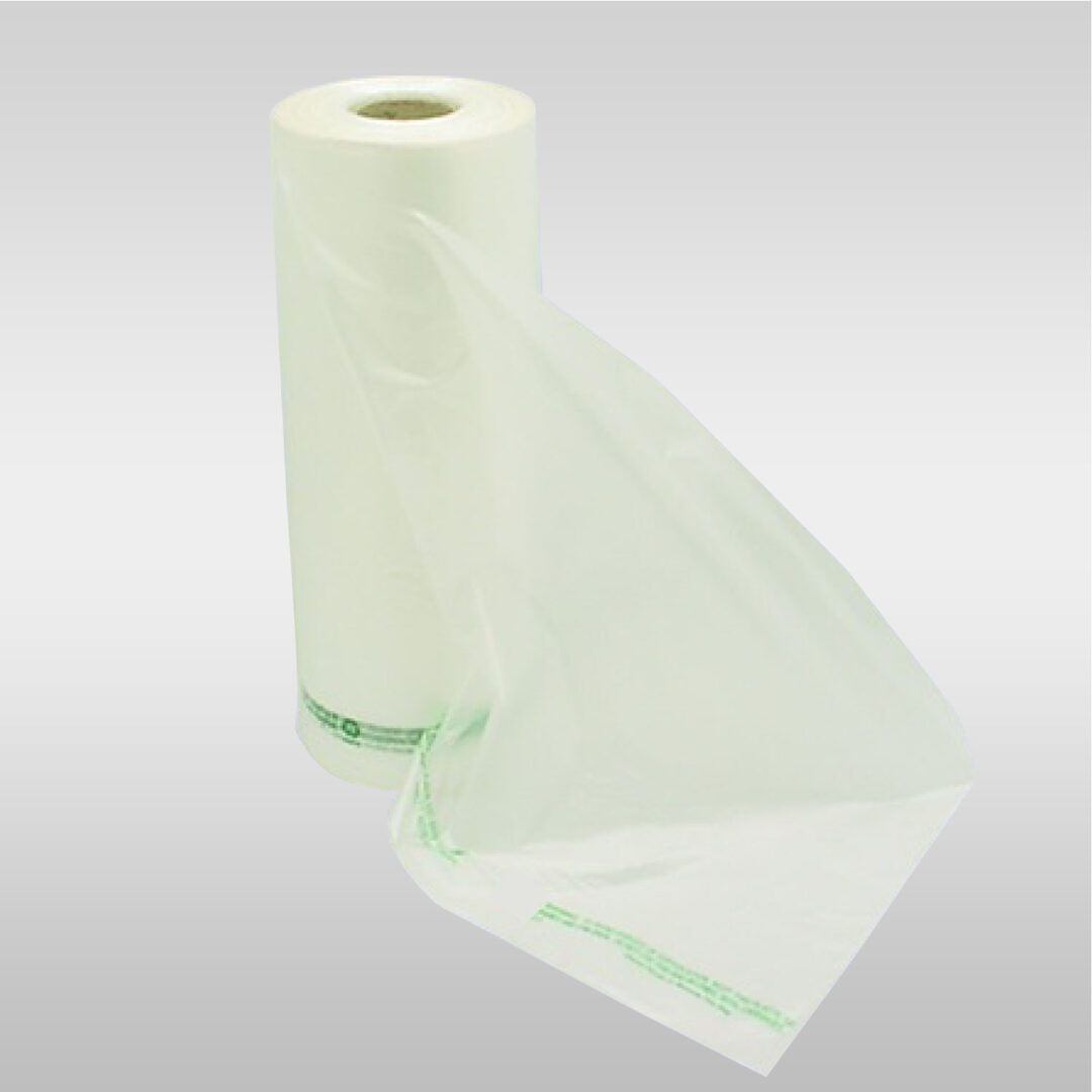 A roll of plastic wrap is sitting on the floor.