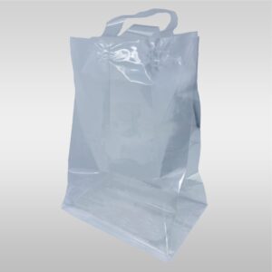 A clear plastic bag with handles on top of it.