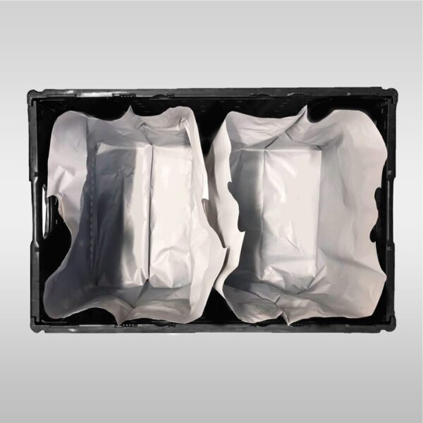 A black box with two white bags inside of it.
